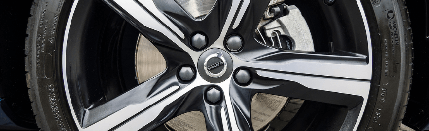 Need Volvo Repair? Start with Brake Repair in Cleveland Heights, OH with Heights Swedish Solutions. Closeup image of brakes and pads on volvo sedan